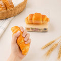 12PCS - Croissant Loaf Squeeze Squishy Stress Relief Toy